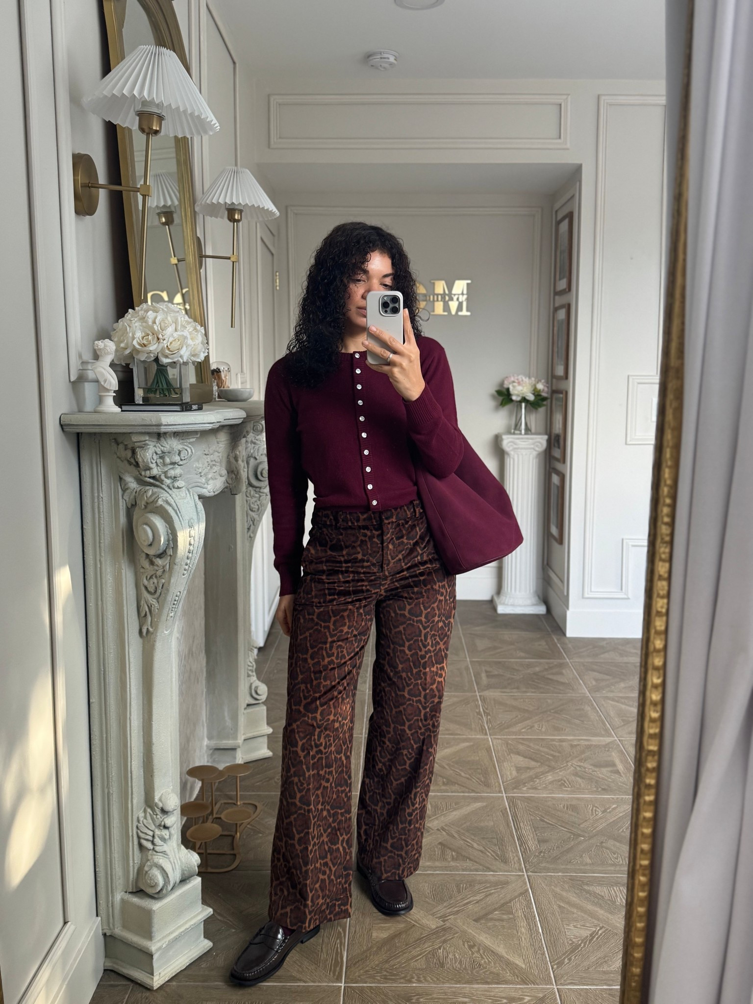 burgundy cardigan, leopard print velvet pants, burgundy bucket bag, burgundy socks, and brown penny loafers 

#LTKootd