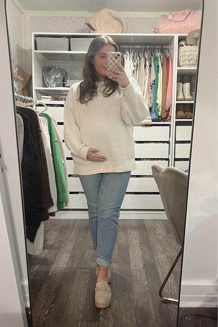 Bump Style: 21 Weeks pregnant
Non maternity jeans with belly band chunky neutral mules oversized cozy sweater 

#LTKbump #LTKfindsunder100 #LTKfindsunder50