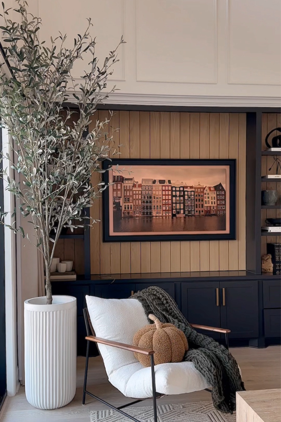 Faux olive tree is 9 feet and planter is the extra tall in chalk. It’s very realistic and come in a variety of sizes  

#LTKSeasonal #LTKhome