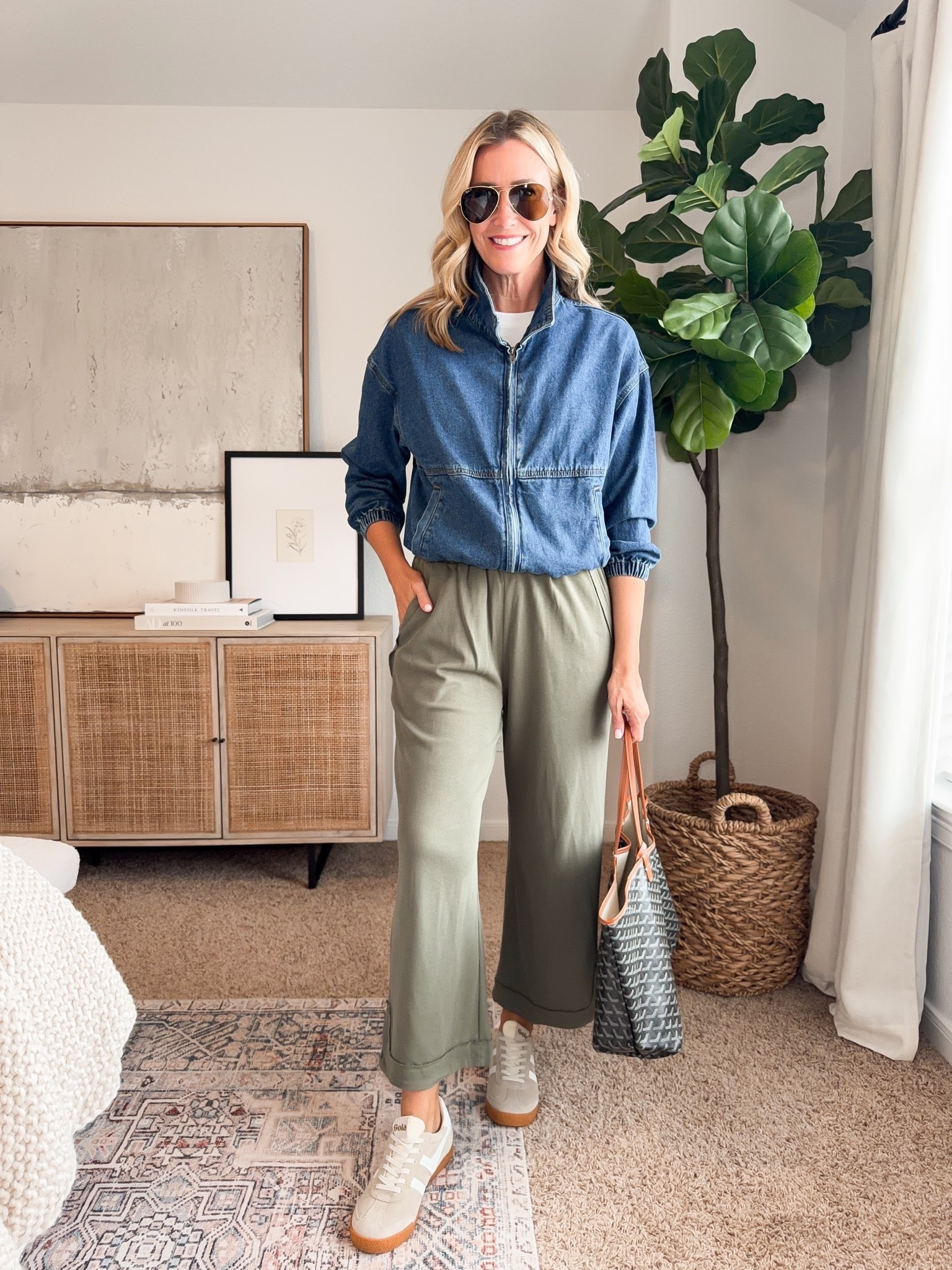 This denim jacket makes these wide leg pants feel completely different. I love the combination of denim, soft olive and neutral sneakers for an easy outfit that feels casual but still pulled together.

denim jacket, olive pants, wide leg pants, neutral sneakers, casual fall outfit, everyday fall style, denim outfit, travel outfit, comfortable outfit, fall wardrobe, women’s fall fashion, HauteandHumid

#LTKootd #LTKSeasonal #LTKOver40