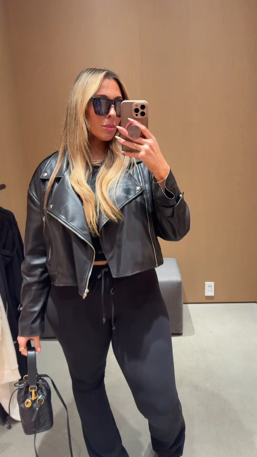 These Alo pants are so soft, stretchy and flattering. They run so long. Wearing a size L 

Black T shirt tied up size medium (amazing quality) 

This cropped faux leather jacket is old linked a similar option

P600 Nikes linked the colorway I am wearing and similar versions. These are so comfortable 

#LTKMidsize #LTKTall #LTKootd