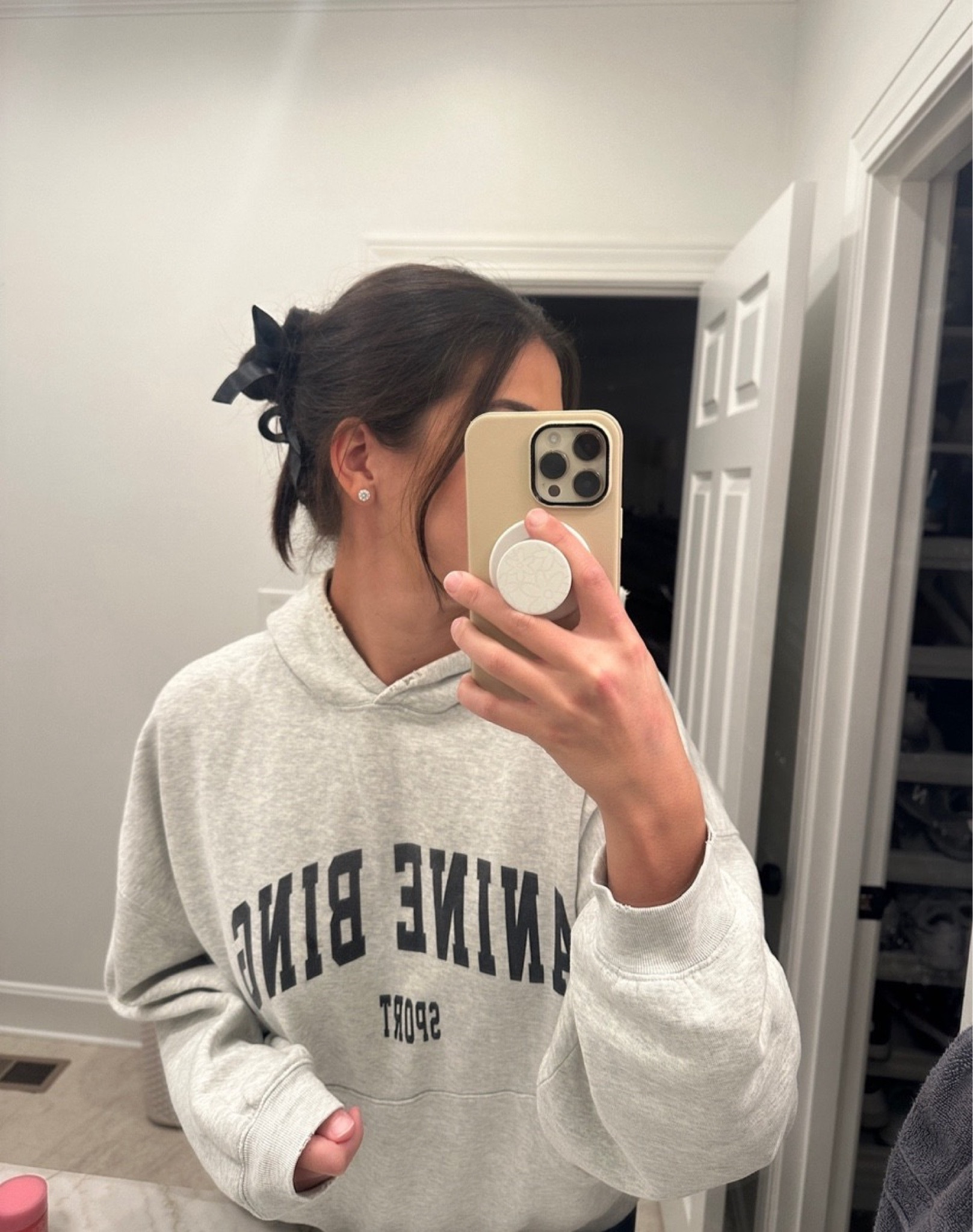 Bow clip - Bow detail - Annie bing - graphic sweatshirt - casual winter outfit 

#LTKstyletip #LTKSeasonal