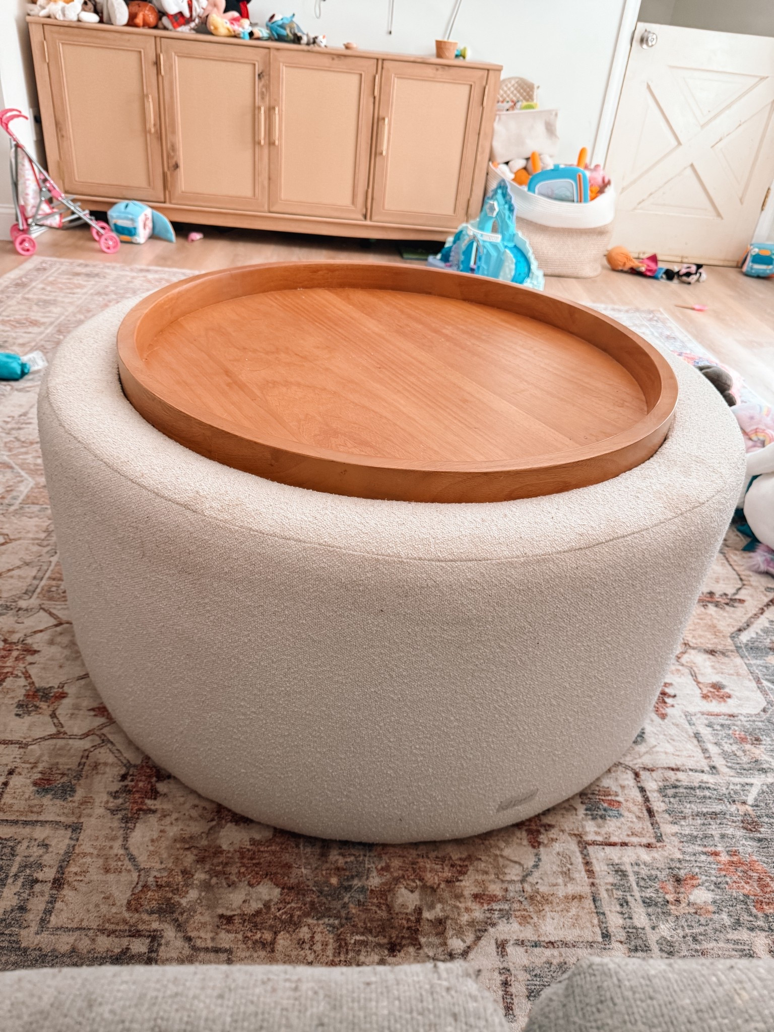 Ottoman and entertainment center in our living room. Love the storage under the ottoman top and the cabinets for toys!

#LTKHome #LTKOver40 #LTKFamily
