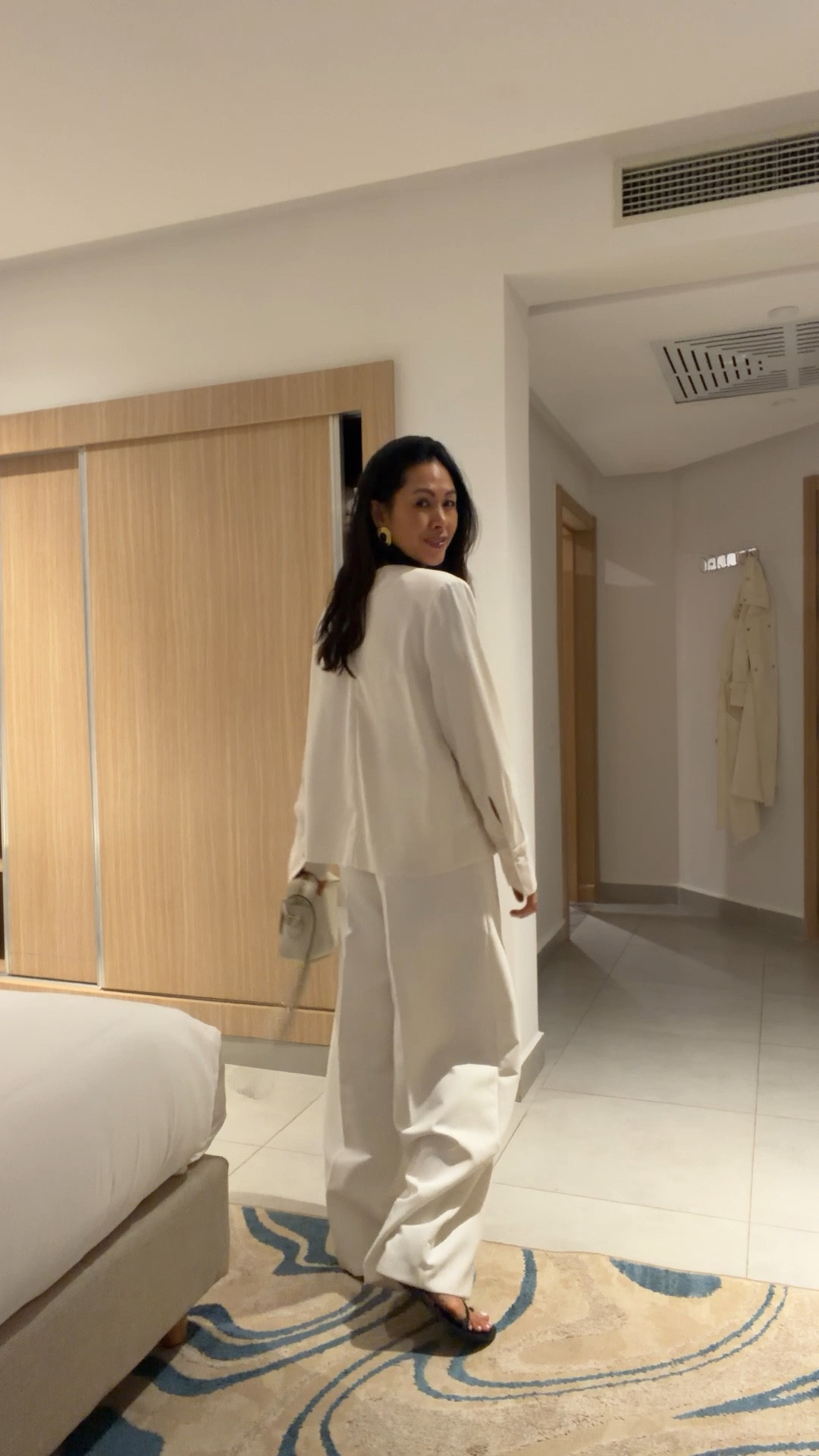 All white on the night 
Wearing my old shoulder pad top size small
And hire wide leg trousers size 6 ( size down) 
Ancient Greek sandals 
Old gucc camera bag
Soru earrings 

#LTKTravel #LTKootd #LTKOver40