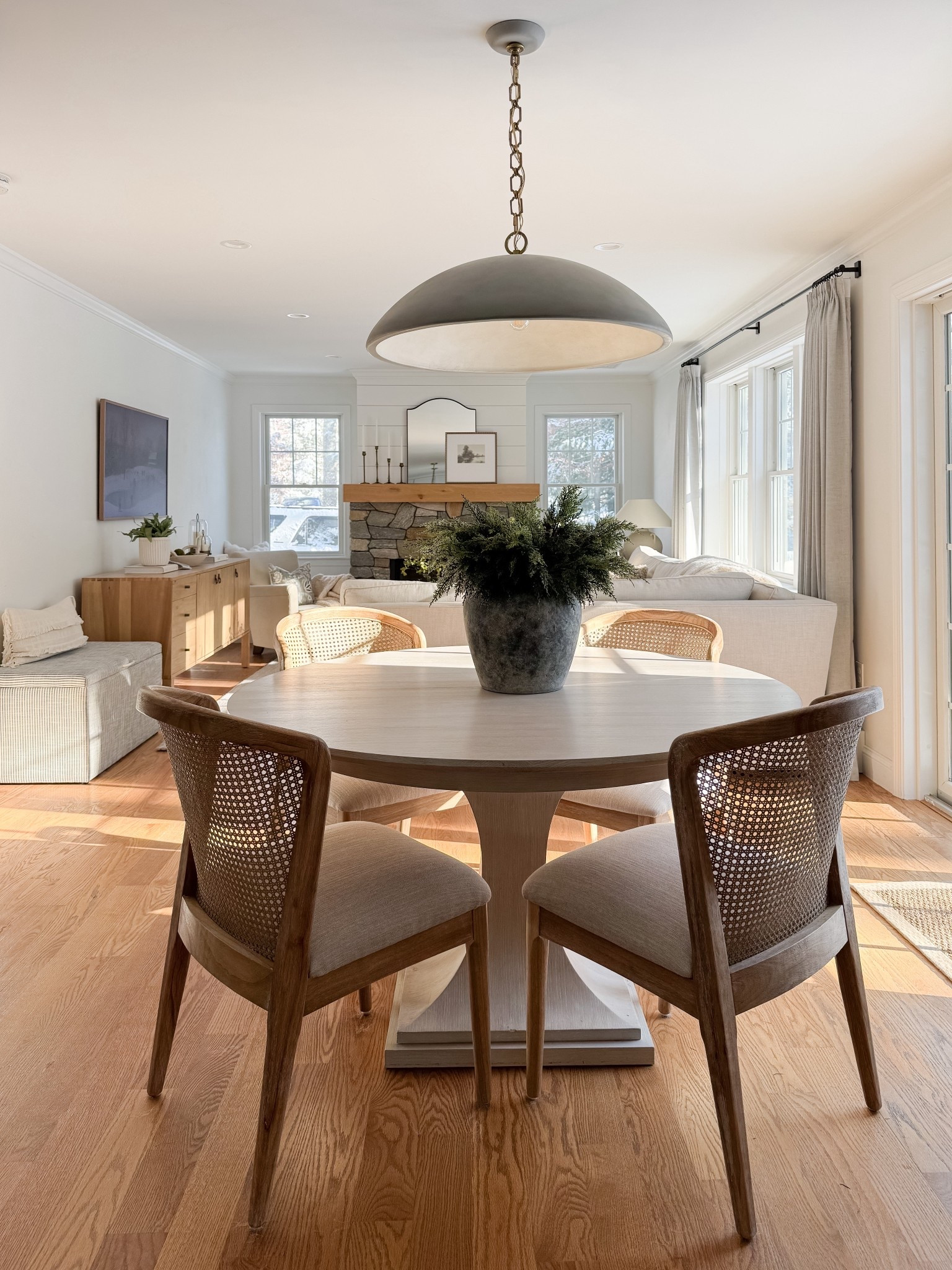 Light filled dining space! A bright dining area styled with warm wood tones, woven chairs, and soft neutrals for a relaxed coastal gathering space. 

Coastal dining room, neutral dining space, woven chairs, cape cod home, warm wood tones, casual dining, timeless home decor, coastal interiors, Sherri Calnan Home

#LTKFindsUnder50 #LTKHome
