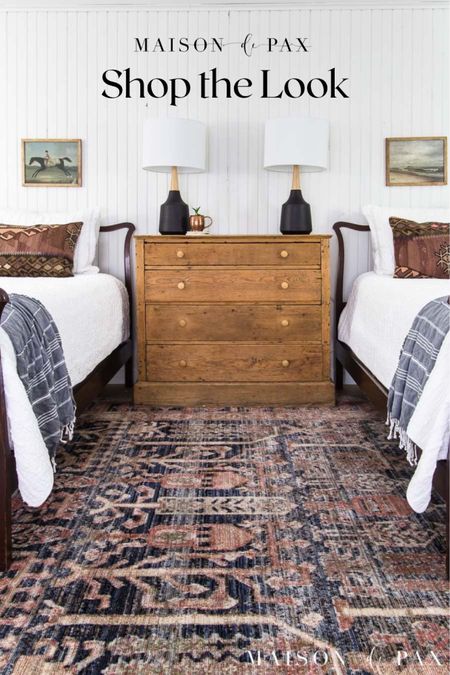 Create a rustic modern bedroom with this  beautiful roundup of decor! Black lamps, antique art prints, antique dresser and beds, ruffled quilt 

#LTKfamily #LTKhome