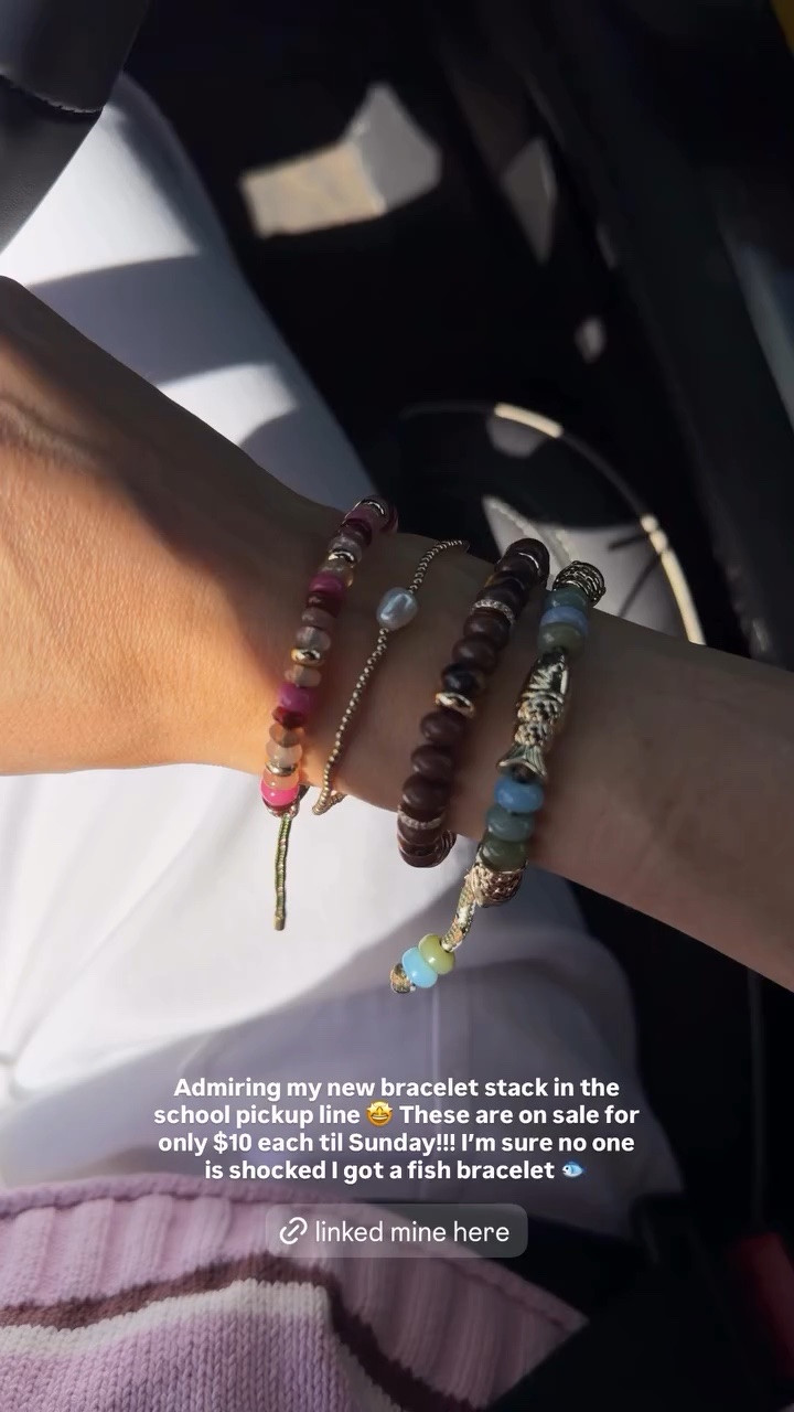 Admiring my new bracelet stack in the school pickup line 🤩 These are on sale for only $10 each til Sunday!!! I’m sure no one is shocked I got a fish bracelet 🐟