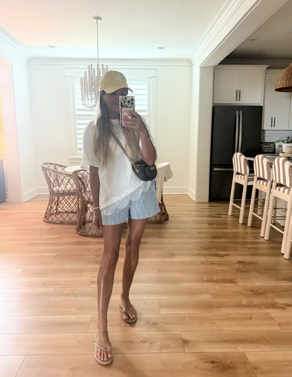 Easy summer outfit with all the cutest details 💙 Striped shorts, a lace-trim tee, neutral sandals, and the crossbody bag I keep reaching for. Everything is linked!
 

 #LTKgrwm #LTKootd #LTKmomlife