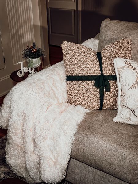 Bow tie on pillows to make them more festive and match your holiday decor 



#LTKHoliday #LTKSeasonal #LTKhome