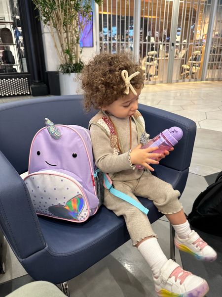 Found the cutest narwhal toddler book bag for travel fits snacks and activities all comfortably a version is sold with an attached leash for safety

#LTKBaby #LTKFamily #LTKKids