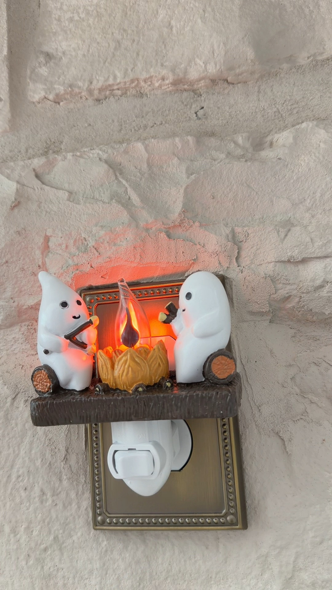 The cutest Halloween night light has officially stolen my heart! 👻🧡 This adorable ghost campfire plug-in night light adds the perfect cozy glow to any space. Two sweet little ghosts roasting marshmallows around a flickering campfire make it the most charming Halloween home decor piece for entryways, kitchens, bathrooms, hallways, nurseries, or anywhere you want a soft nighttime glow.

I love decorating for Halloween without making my home feel spooky, and this fits my cozy neutral aesthetic perfectly. The warm flickering flame looks like a real campfire, making it such a fun accent for fall. It’s small enough to plug into any outlet but makes a huge impact with its adorable details. If you’re looking for cute Halloween decorations instead of scary decor, this is one of my favorite finds this season!

Perfect for:
✨ Halloween night light
✨ Ghost decor
✨ Cozy Halloween home decor
✨ Neutral Halloween decorations
✨ Fall home decor
✨ Plug-in night light
✨ Bathroom night light
✨ Kitchen night light
✨ Hallway decor
✨ Entryway decor
✨ Ghost lovers
✨ Cottagecore Halloween
✨ Whimsical Halloween decor
✨ Cute spooky season finds
✨ Fall decorating ideas

Save this for your Halloween decorating inspiration, and don’t wait too long—these adorable seasonal finds always sell out before October! 🎃👻

#LTKSeasonal #LTKHome