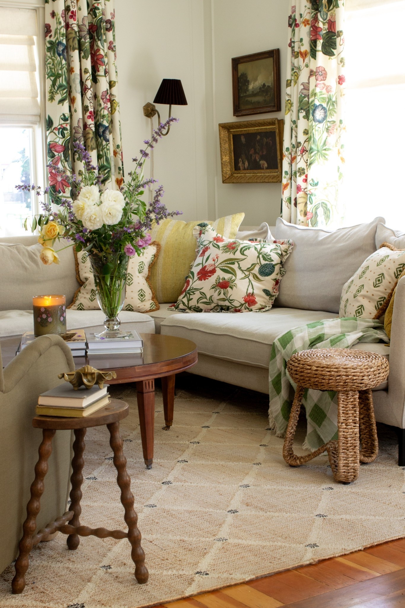 Cottage core living room, floral curtains, floral pillows, green room, corner sectional, interior define, wicker stool, bobbin stool, jute rug, diamond jute rug 

#LTKSeasonal #LTKSummerEdit #LTKHome