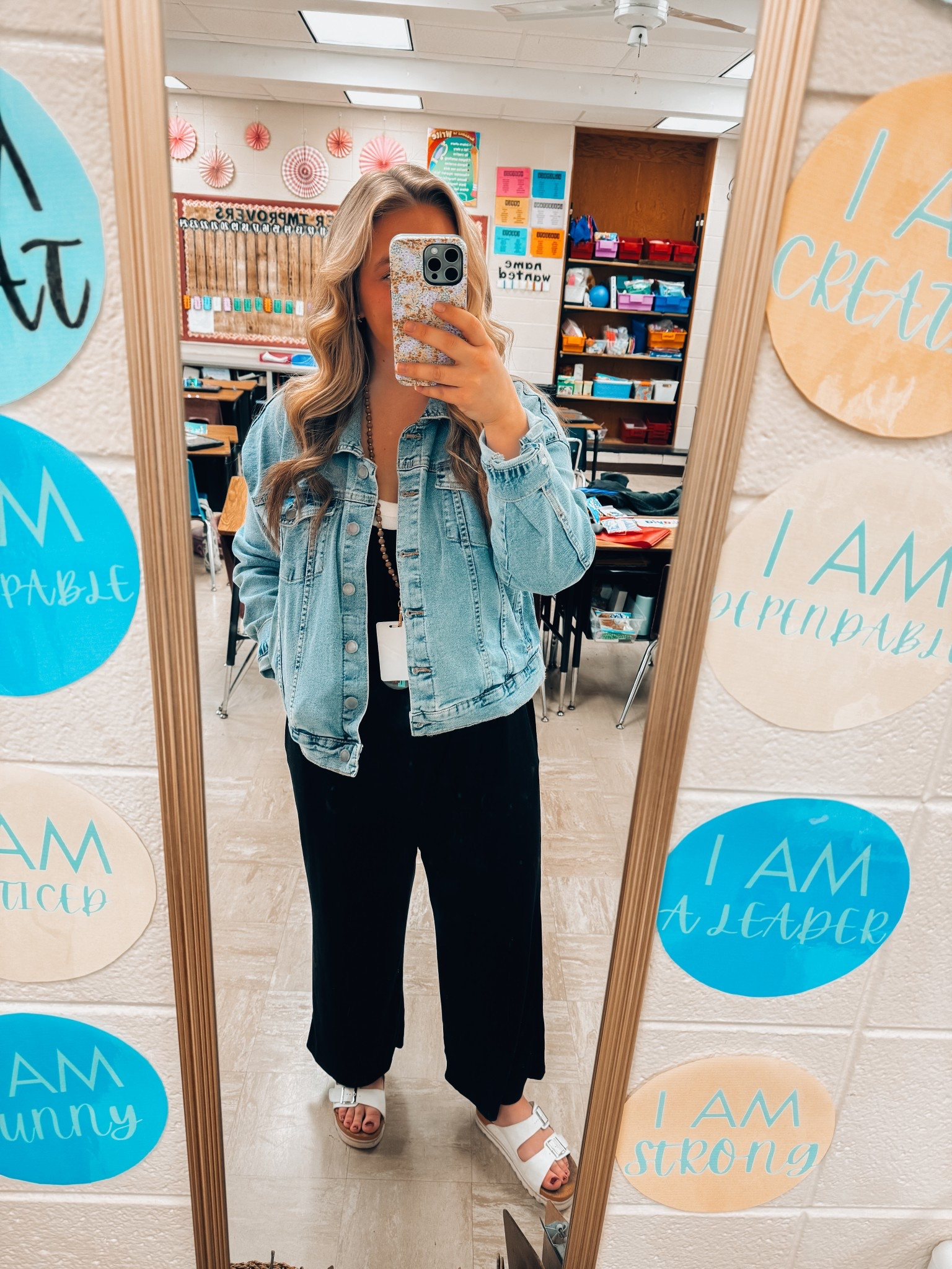 Cute and comfortable spring teacher outfit - soft black jumpsuit with pockets - light denim jean jacket - platform buckle slip on slides - teacher looks for end of the school year 

#LTKFindsUnder100 #LTKMidsize #LTKFindsUnder50