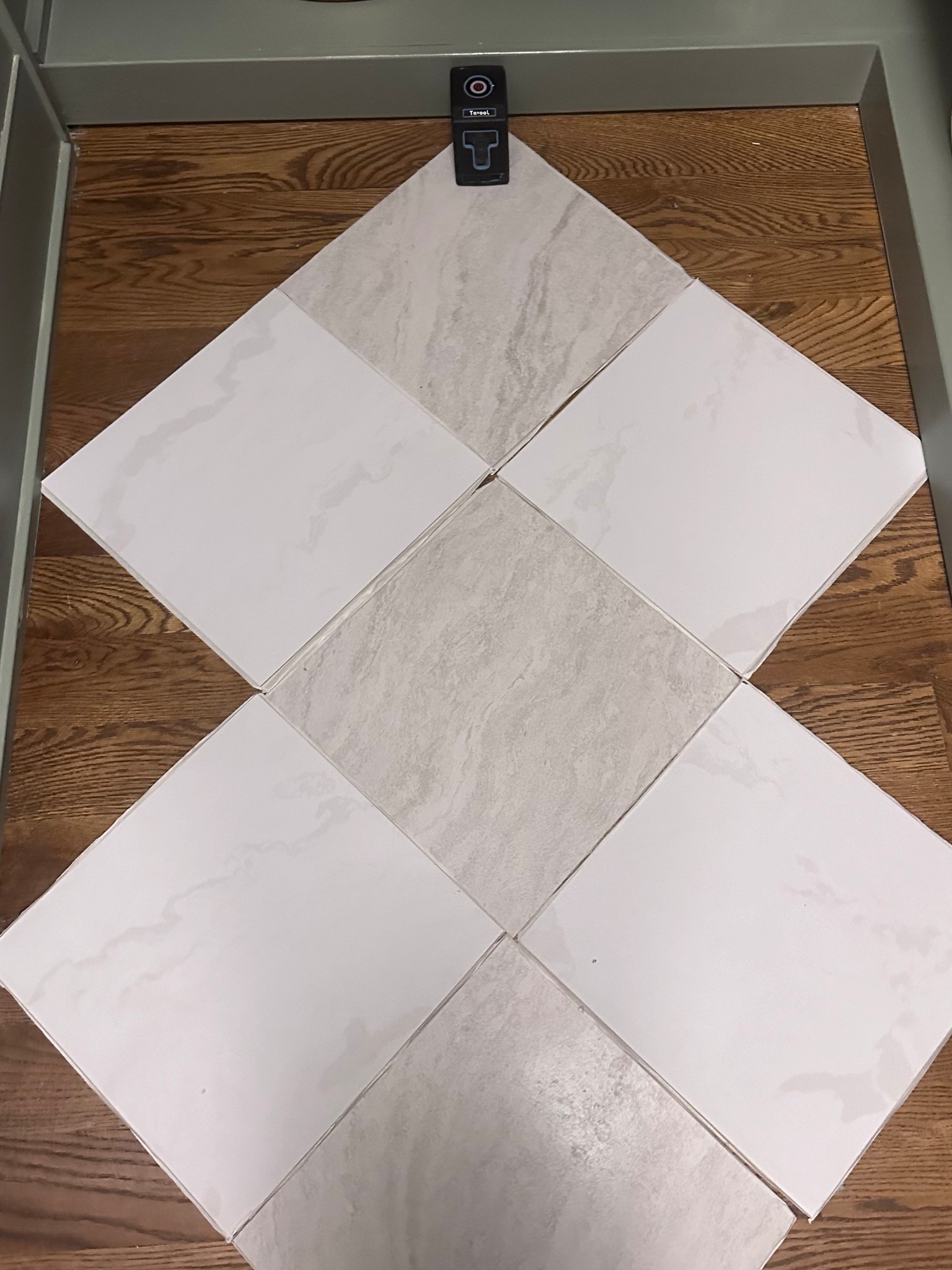 The peak and stick Tile I used for the pantry floor