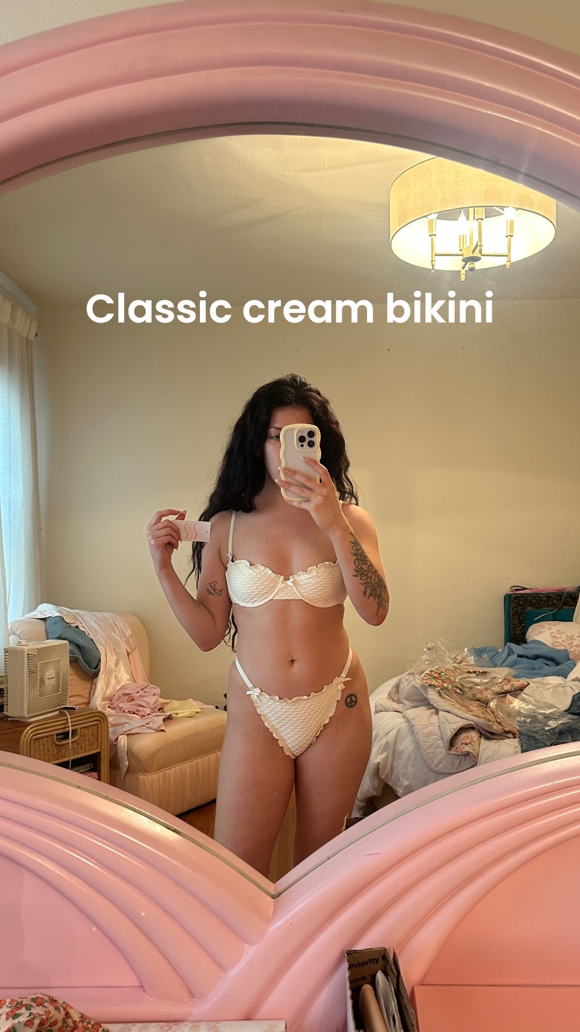 Classic cream bikini with scallop style texture and lettuce edging and underwire top. Will never go out of style!! Truly classic silhouette and coloring 

#LTKSwim #LTKFestival #LTKTravel