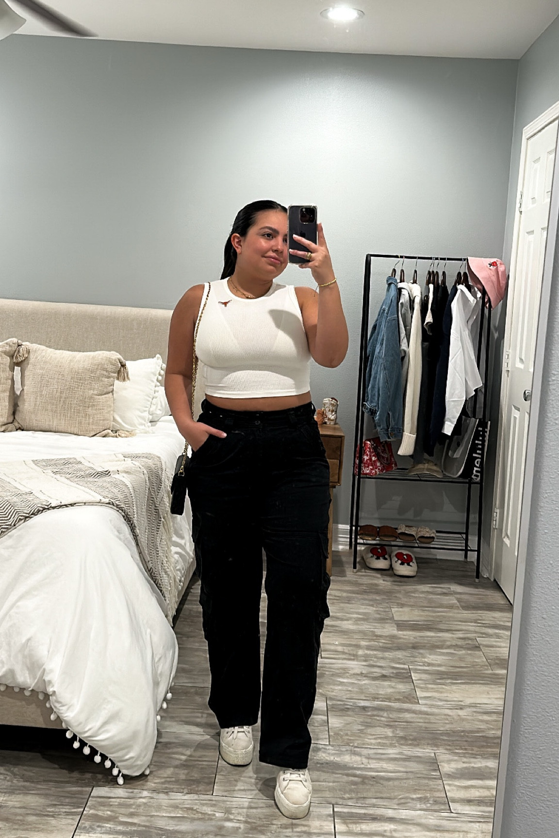 Weekend casual outfit 
Abercrombie cargo pant 
Black cargo pant 
White tank top
Skims bralette 
Louis Vuitton Purse 

#LTKstyletip #LTKSale #LTKitbag