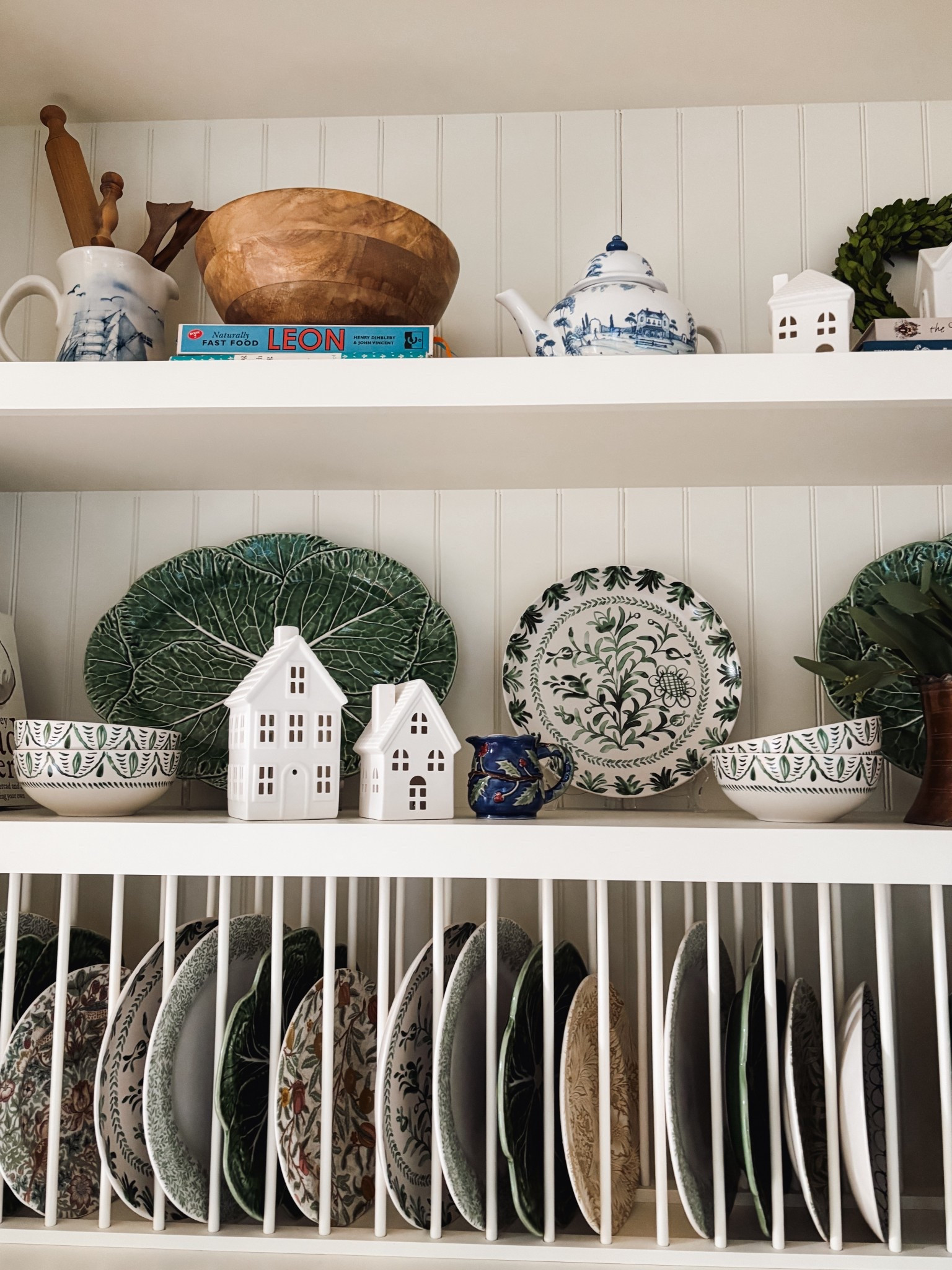Kitchen Christmas shelf sources- Dish sets, cabbage oval platters, blue and white teapot, green and white plates also available in blue, similar white ceramic houses 

#LTKSaleAlert #LTKHome #LTKHoliday