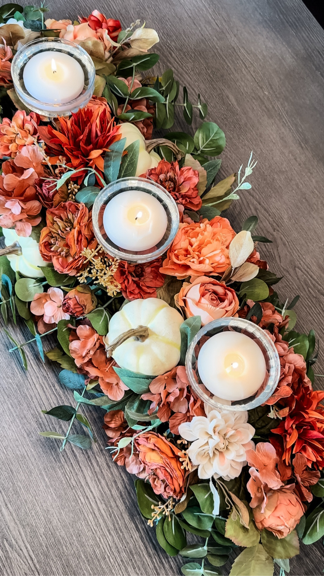 DIY Pool Noodle Floral Centerpiece 🍂 Elevate your table decor with this easy DIY. Transform a simple pool noodle into a stunning illuminated centerpiece adorned with vibrant florals. A creative and budget-friendly way to add charm and elegance to any gathering. 

Looks like a professional premade arrangement, expertly crafted, with no hint that a pool noodle is the secret behind holding your centerpiece together. Say goodbye to the hassle of dry oasis blocks with this solution!

To create your own, start by folding the pool noodle in half and sliding 2-3 wine or compote glasses in between the noodle, evenly spaced and secure with zip ties. Arrange your choice of faux florals and greens by inserting into the noodle, ensuring to start with your greenery and work to cover all sides, layering in your biggest to smallest floral elements. 

Fill your glasses with water, add floating candles, and enjoy! This versatile DIY can be customized for any season or event, making it a versatile centerpiece for all occasions. 

#diyfalldecor #poolnoodlecenterpiece #diycenterpiece #fallflorals #falltablescape 

#LTKSeasonal #LTKHome #LTKStyleTip