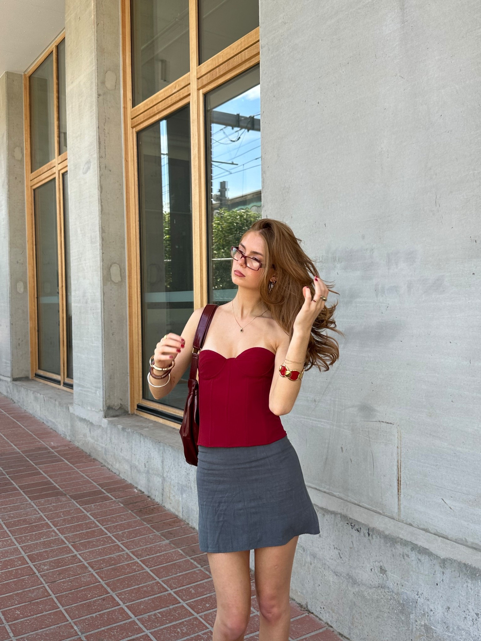 Red corset top, grey mini skirt, red pump heel shoes and bag, styling advice, outfit inspiration, styling tips, street style, dinner attire, women’s fashion 2025, trending style, Pinterest style, Pinterest girl outfits, aesthetic fashion, mini skirt styling

#LTKaustralia #LTKstyletip #LTKsummer
