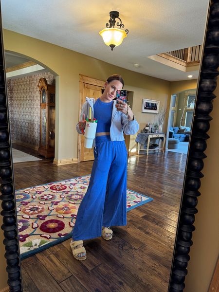 Love this bright blue free people matching set! The wide leg pants with the cropped tank top are perfect for summer! Paired with my lululemon jacket and Prada sandals. 

#LTKOver40 #LTKSeasonal #LTKStyleTip
