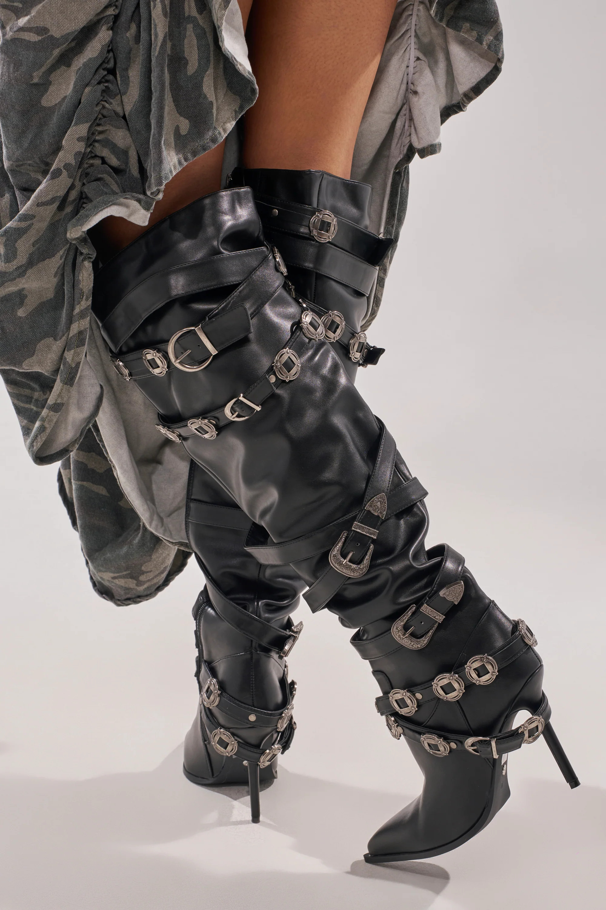 AKIRA GOLD XERXES BLACK STILETTO METAL EMBELLISHED BOOT | AKIRA