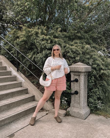 Comfy spring to summer midsize outfit - graphic sweatshirt (sized up to XXL for an oversized fit), pink linen striped boxer shorts (tts, wearing L), Amazon Birkenstock inspired clogs, Coach shoulder bag


#LTKspring #LTKcanada #LTKmidsize