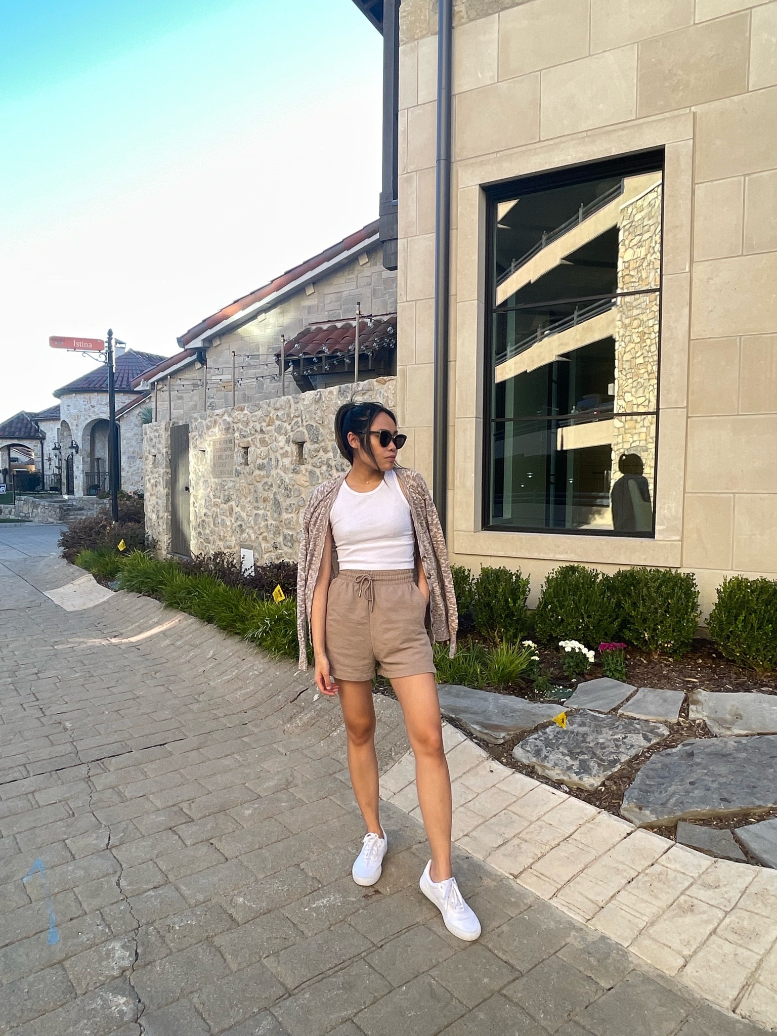 Fall lounge casual outfit, neutral style, beige aesthetic, white cropped tank top, taupe lounge shorts, sweatshorts, cardigan, white sneakers, adidas shoes, H&M

#LTKstyletip #LTKunder100 #LTKSeasonal