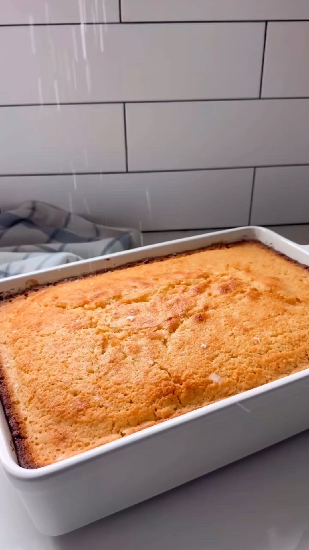 Alright my friends, you loved my twist on the @krusteaz cornbread with the creamed corn and I thought it was time to show you how I make it into a party-size serving instead of individual muffins ✨
This recipe is the yields the most tender + moist cornbread EVER!! Perfect for any gathering! 
From BBQ’s to Brunch, you’ll have a crowd gathering and gobbling this up!

🩵Party Size Cornbread🩵
3 boxes @krusteaz cornbread mix 
1 1/2 cup buttermilk (do not substitute)
3 eggs
1 cup oil (pick one: avocado, olive, vegetable) 
Two 14.75 ounce cans of creamed corn 

Pre heat the oven to 375°
Butter a 9x13 baking dish 

🩵In a mixing bowl, add the cornbread mix, buttermilk, oil, eggs, and canned creamed corn 
🩵Stir this all together until smooth and pour into the buttered baking dish 
🩵Cover with foil and bake at 375° for 30 minutes 
🩵Remove the foil and continue to bake for an additional 40-50 minutes until cooked all the way through 
🩵Check at the 40 minute mark by sticking a toothpick into the center. It should come out clean or with few crumbs attached when it’s fully cooked
🩵Sprinkle with sea salt while warm - ENJOY!!