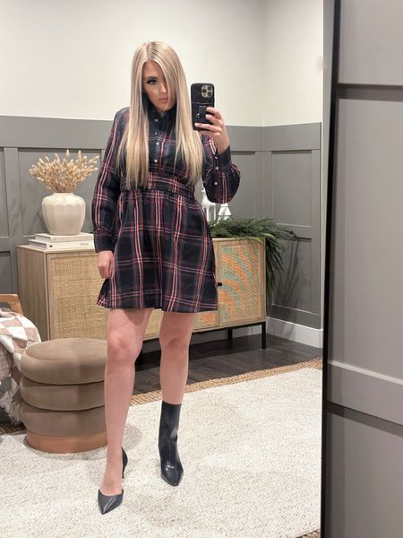 This cute mini shirt dress is under $40 & so fun for the holidays! The smoked waist detail is so flattering. Showing it paired with heels or booties here. You could also wear it with over the knee boots + dress it up with patterned tights. Fits TTS. I’m wearing size XS. (5’8” + 120 lbs) 

Family Photo Outfit Idea - Thanksgiving Outfit - Christmas Dress - Walmart - Black Boots - Black Heels - Cute Dress 

#dress #holidayoutfit 

#LTKshoecrush #LTKstyletip #LTKover40