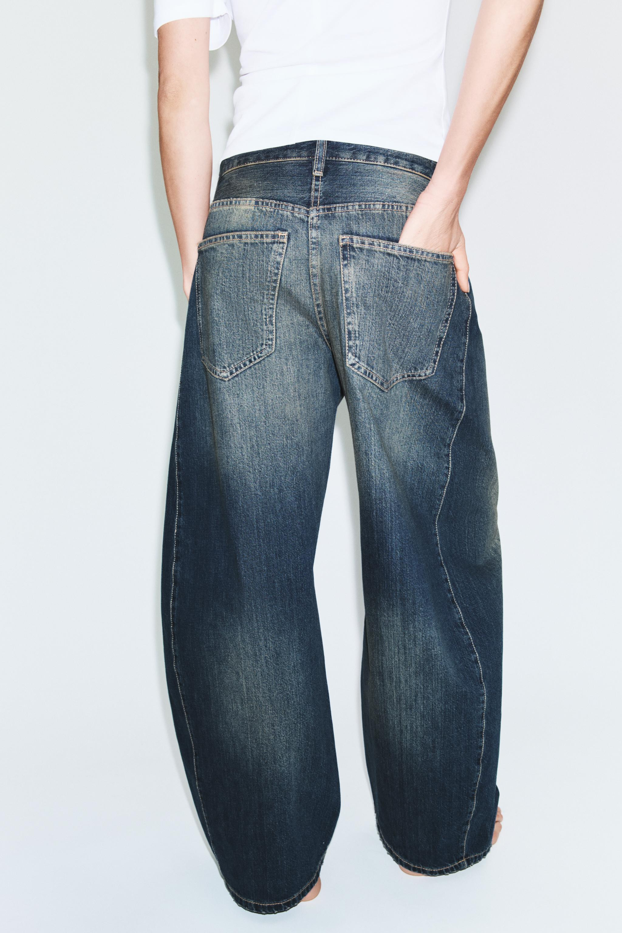 DescriptionContentsMeasurementsMID-RISE - OVERSIZEMid-rise jeans with belt loops and five pockets... | Zara US