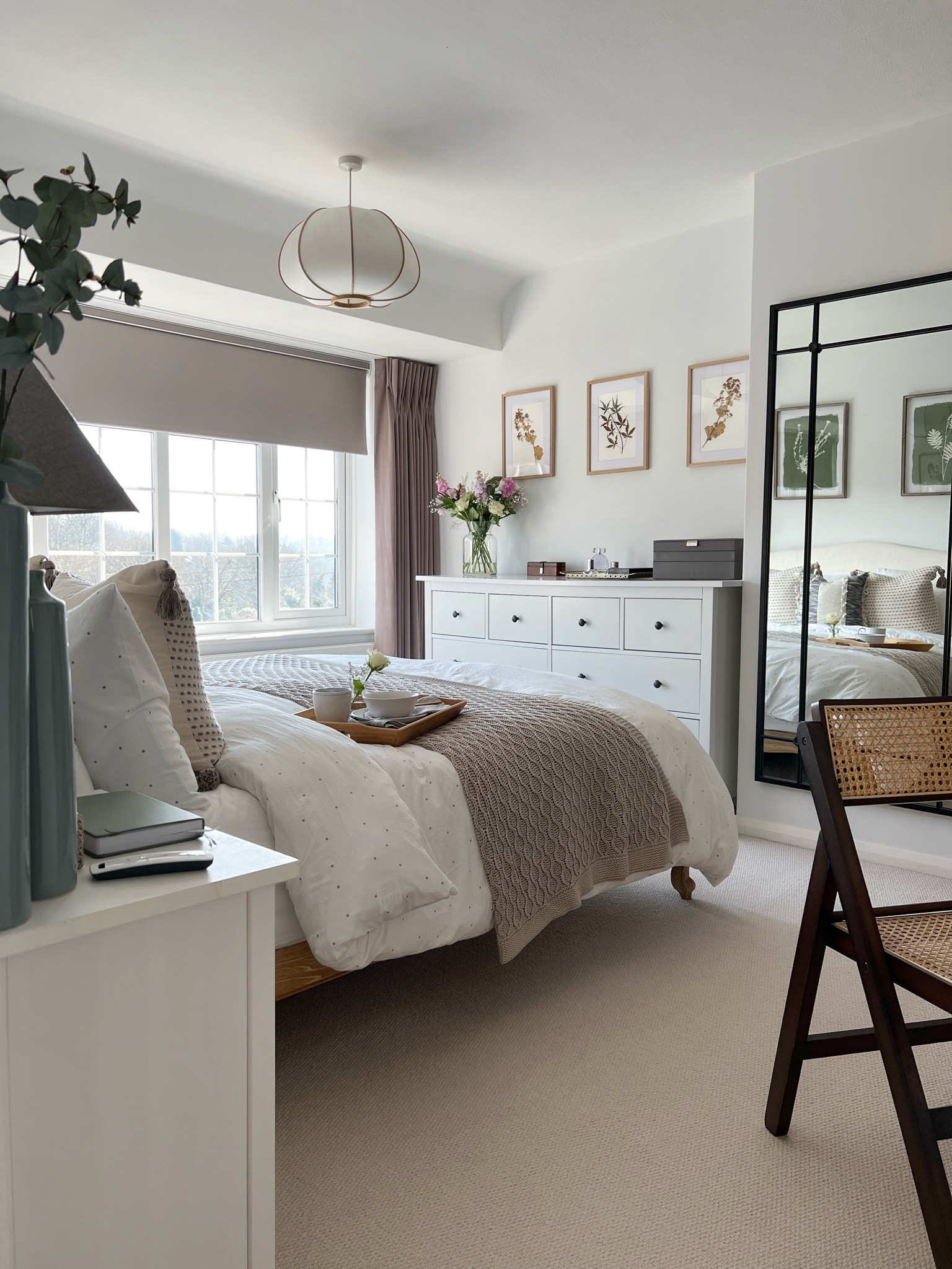 Main bedroom home furnishings and home accessories including ceiling pendant lighting, folding rattan chair and cushions  

#LTKeurope #LTKhome #LTKuk