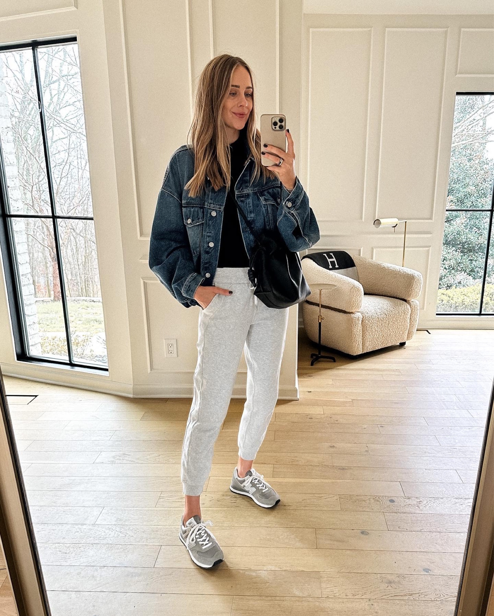 Fashion Jackson, denim jacket, grey joggers, new balance sneakers, Loewe handbag, casual outfit #sneakers 

#LTKstyletip #LTKshoecrush