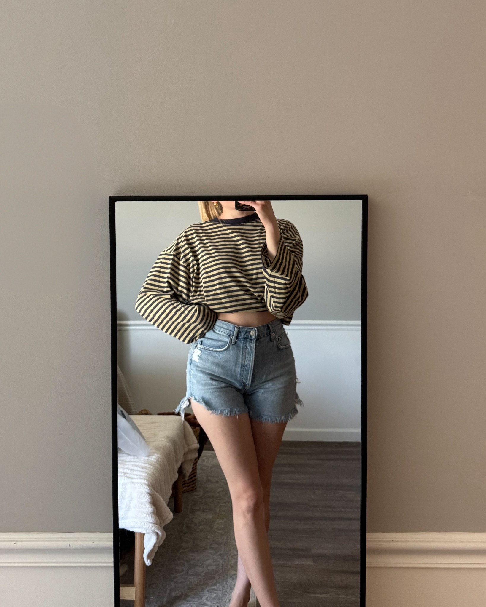 Lioness navy striped tee in my usual size small for a comfy oversized fit!

Shorts are the agolde Dee short in chimes

#LTKFindsUnder100 #LTKSeasonal