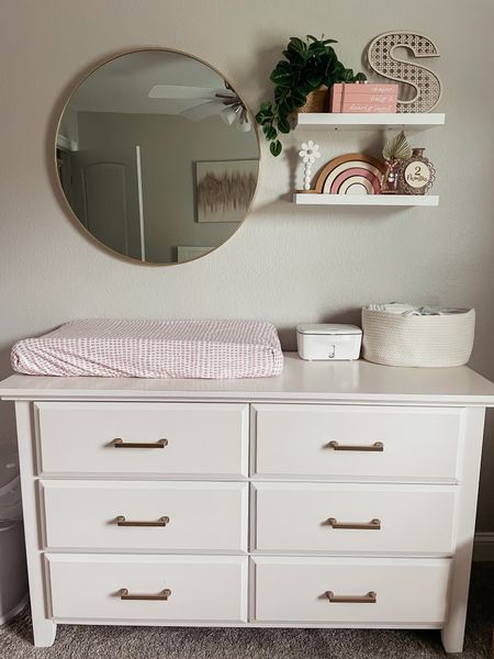 Baby girl nursery with changing table  


#LTKbump #LTKhome #LTKbaby