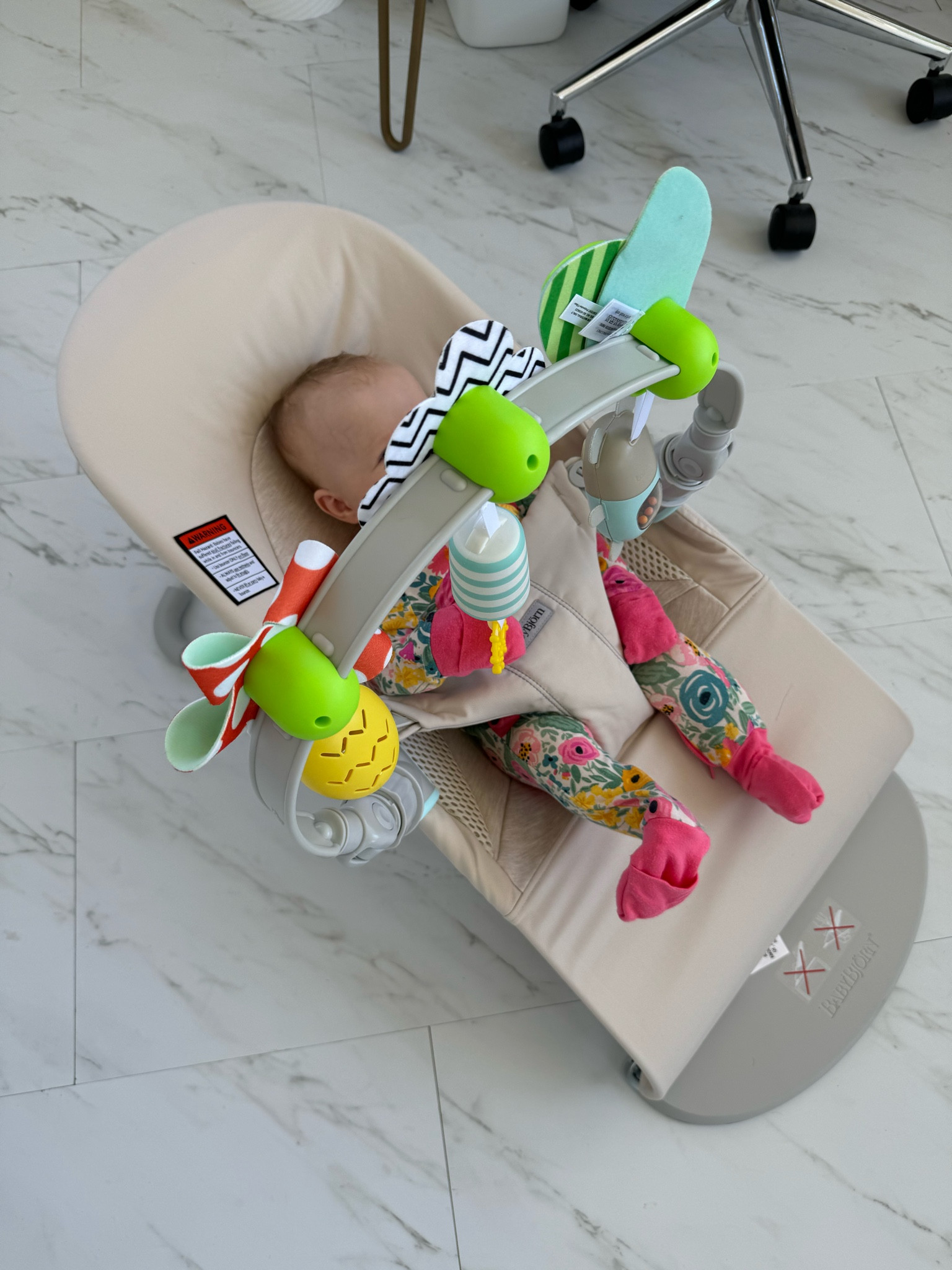 Baby Bjorn Rocker is SUCH a must!! I can put her in it when I’m cooking or doing things around the house. The toys are so entertaining to her so I highly recommend getting the toy attachment!! Also her little sleepies jammies are  SO SOFT!! This is basically what baby girl wears and does every day 🩷

#LTKBaby #LTKBump #LTKKids