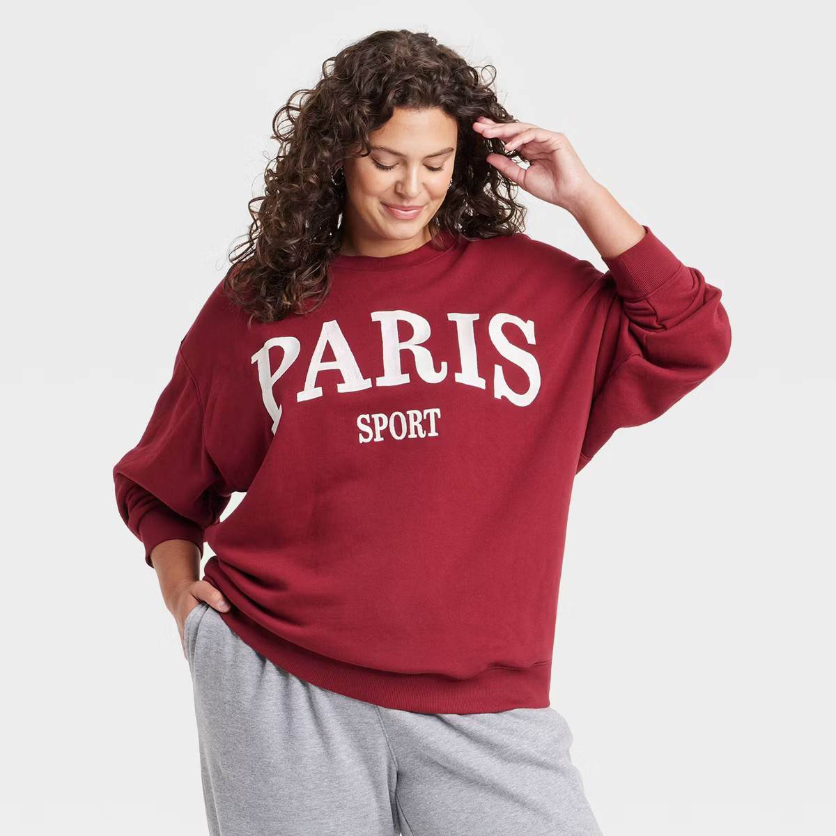 Women's Leisure Studio Oversized Graphic Pullover Sweatshirt - Universal Thread™ Maroon | Target