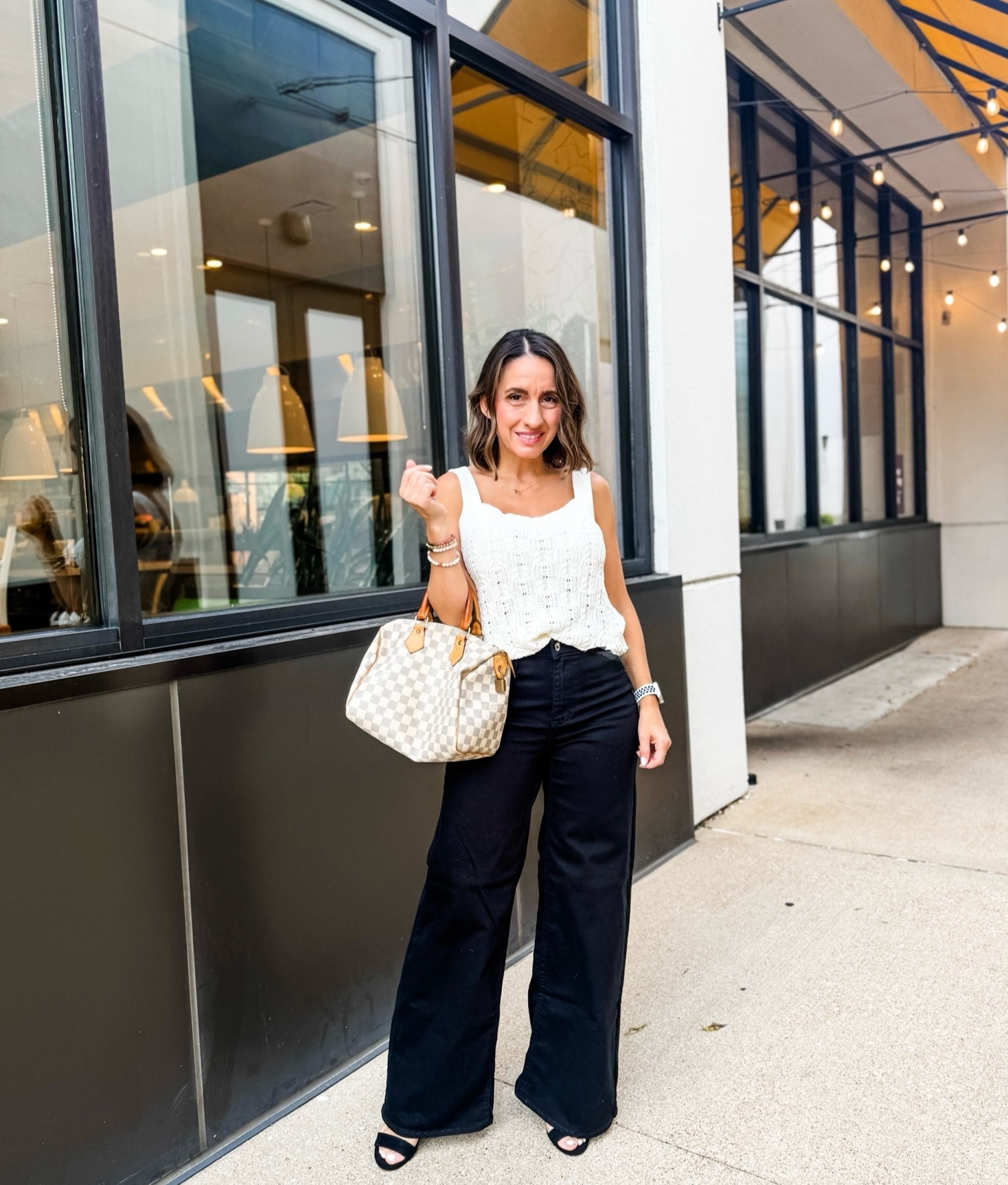 One of my favorite ways to make an outfit feel more fall without adding heavy layers: change the color palette. 🤎

Black wide-leg denim + a knit top gives you that seasonal feel without sacrificing comfort when it’s still warm outside.

These Universal Thread jeans from Target aren’t technically petite, but they work on my 5’0 frame with a heel. They run big, so I recommend sizing down one.

And yes, I went with open-toe heels because it’s still absolutely not bootie weather here. 😂

Everything from this look is linked on LTK.
#petitestyle #targetstyle #fallfashion

#LTKOver40 #LTKPetite #LTKSaleAlert