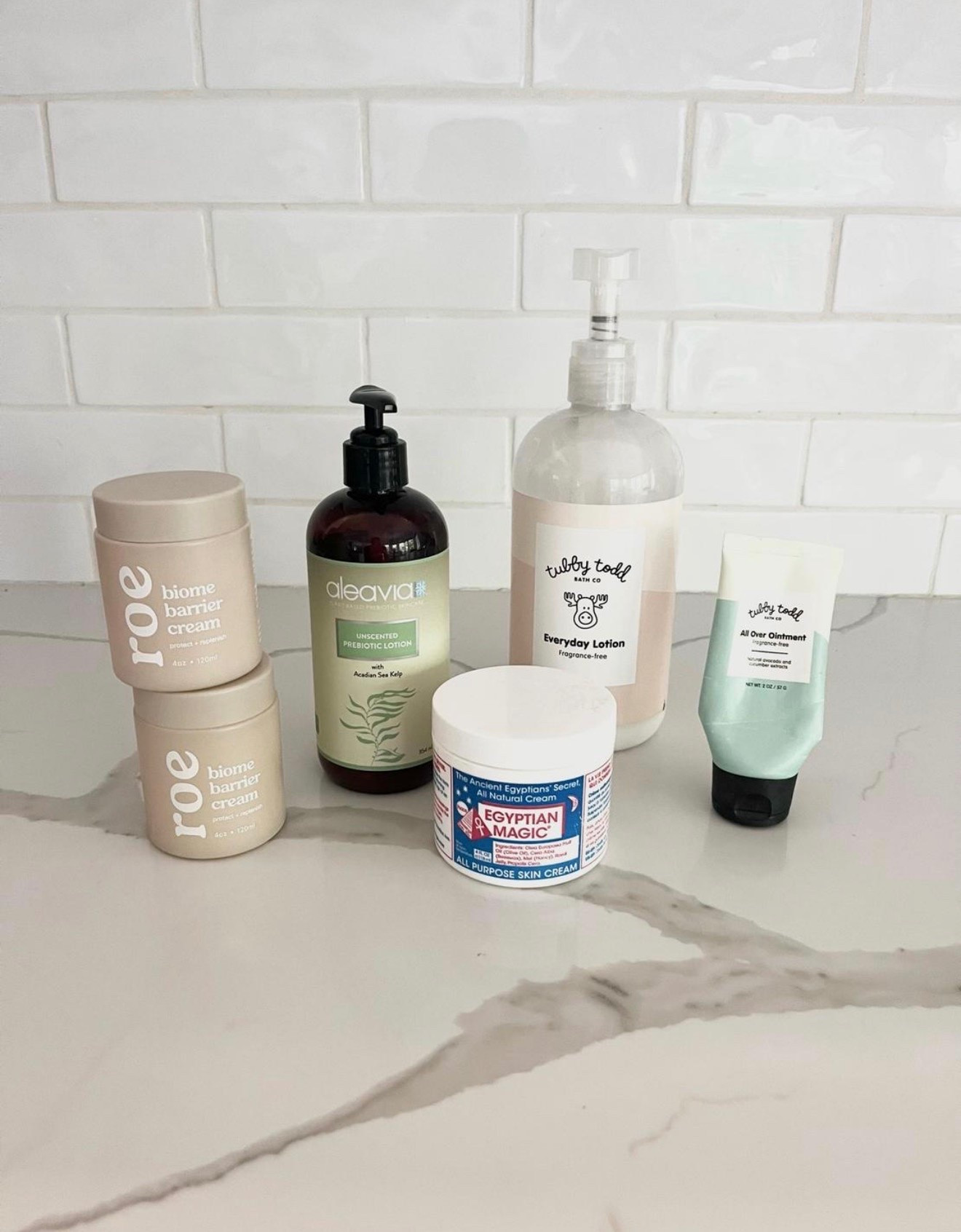 My favorite low tox / “clean” lotions. All are unscented. 

👉🏼Roe is a super thick cream, great for dry patches or eczema. 
👉🏼 Aleavia is it good unscented all over every day lotion
👉🏼 the larger Tubby Todd bottle is another good unscented  every day lotion 
👉🏼 the tubby Todd all over ointment is great for extra dry patches or eczema 
👉🏼 the Egyptian magic is more like a bomb, like to put this under my eyes at night as the last step of my skin care. Also great as a cuticle cream or handcream before bed.


Non toxic lotion 
Non toxic skincare 
Lotion #LTKSummerSales

#LTKselfcare #LTKBeauty #LTKmorningroutine