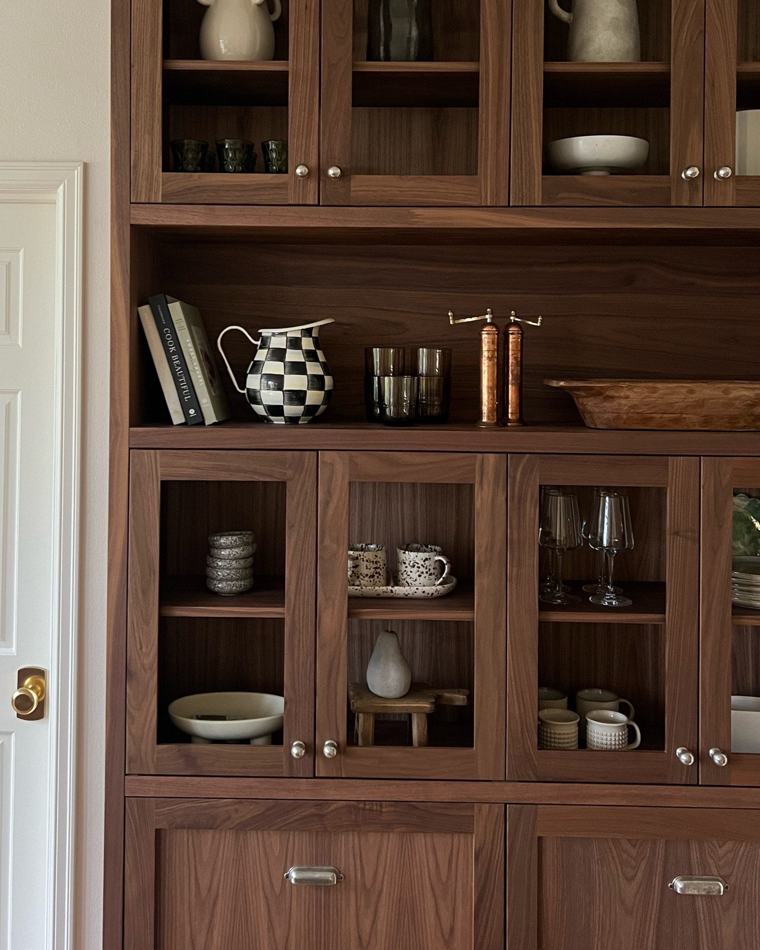 Drawer pulls and knobs we did brushed brass in the kitchen & pewter on the hutch. And door handles for all doors are brushed brass! 

#LTKHome