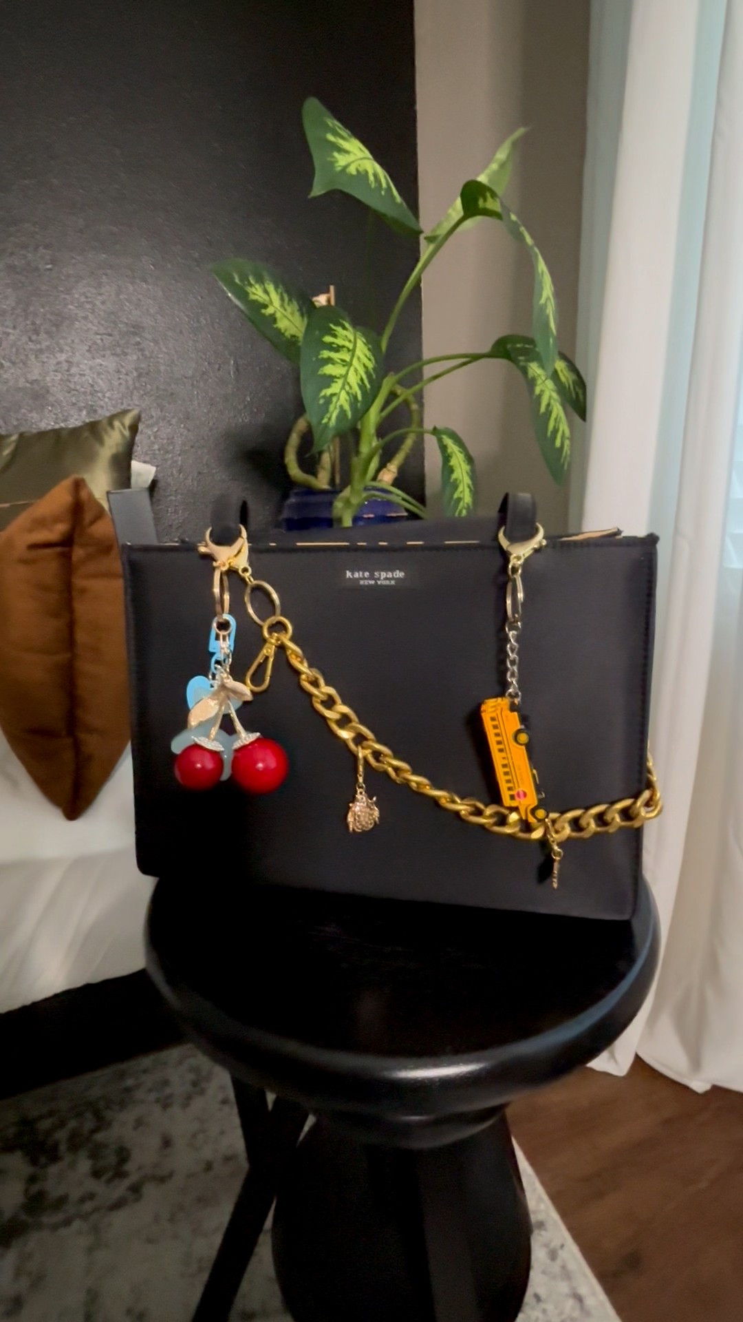 Just wanted to share how I decorated my vintage Kate Spade with some inexpensive charms. #bagcharms

#LTKFindsUnder50