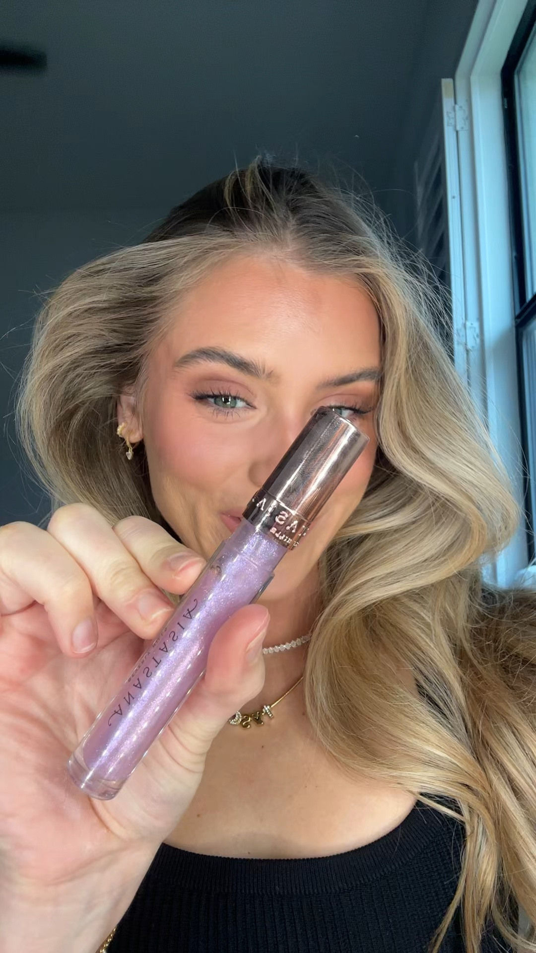 The shade is galaxy. Anastasia Beverly Hills Cosmic Lip Gloss—a weightless lip gloss formula with high-shine luminosity and comfortable wear—available in 5 supernova shades.  Wear alone for glass-like shine with a hint of color or layer over your favorite lipstick to transform into the perfect reflective pout to complete any makeup from everyday to glam. 

#LTKBeauty #LTKWatchNow #LTKFindsUnder50