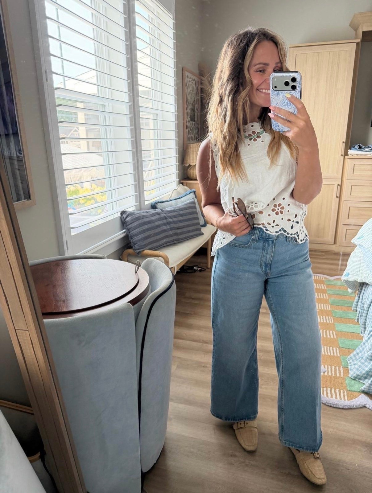 The outfit that makes you look instantly put together 🤍

This eyelet top is one of those pieces that does all the work for you. Paired with these wide-leg jeans, it creates an effortless look that’s perfect for brunch, date night, vacations, or everyday wear. Classic, flattering, and easy to style with pieces you’ll wear on repeat.

#LTKStyle #LTKFinds #PetiteStyle #WideLegJeans #EyeletTop #SummerStyle #CasualChic #EverydayOutfit #DenimStyle #NeutralStyle #CapsuleWardrobe #WeekendStyle