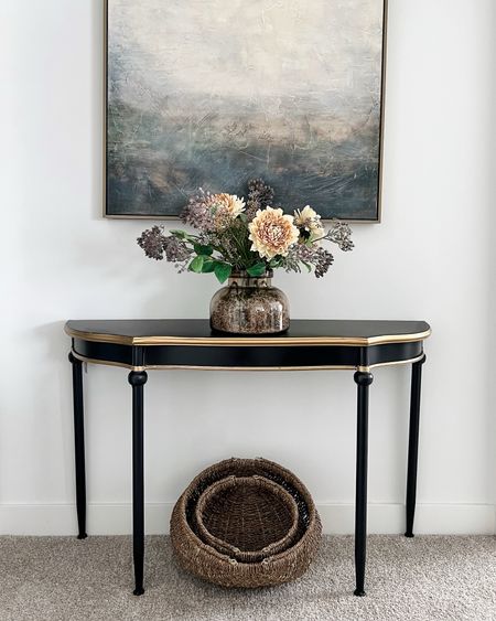 I love this metal demilune table paired with a vase of spring flowers and abstract art for a simple but casually elegant look. 

#LTKhome #LTKfindsunder50 #LTKSeasonal