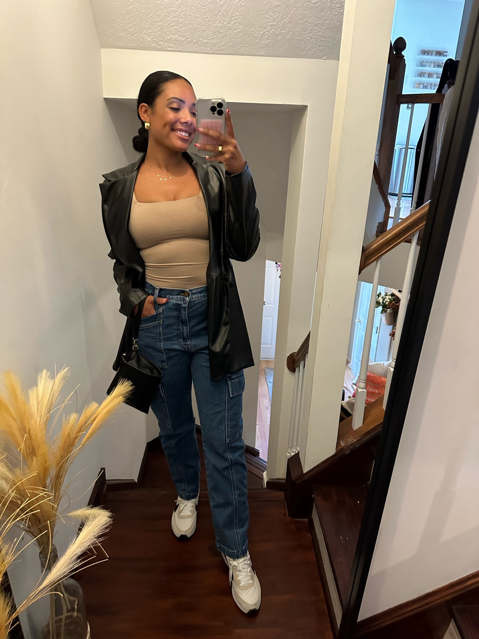 Faux leather jacket with cargo jeans and Nike sneakers- the perfect fall outfit to transition into fall and nighttime 

#LTKSeasonal #LTKsalealert #LTKstyletip