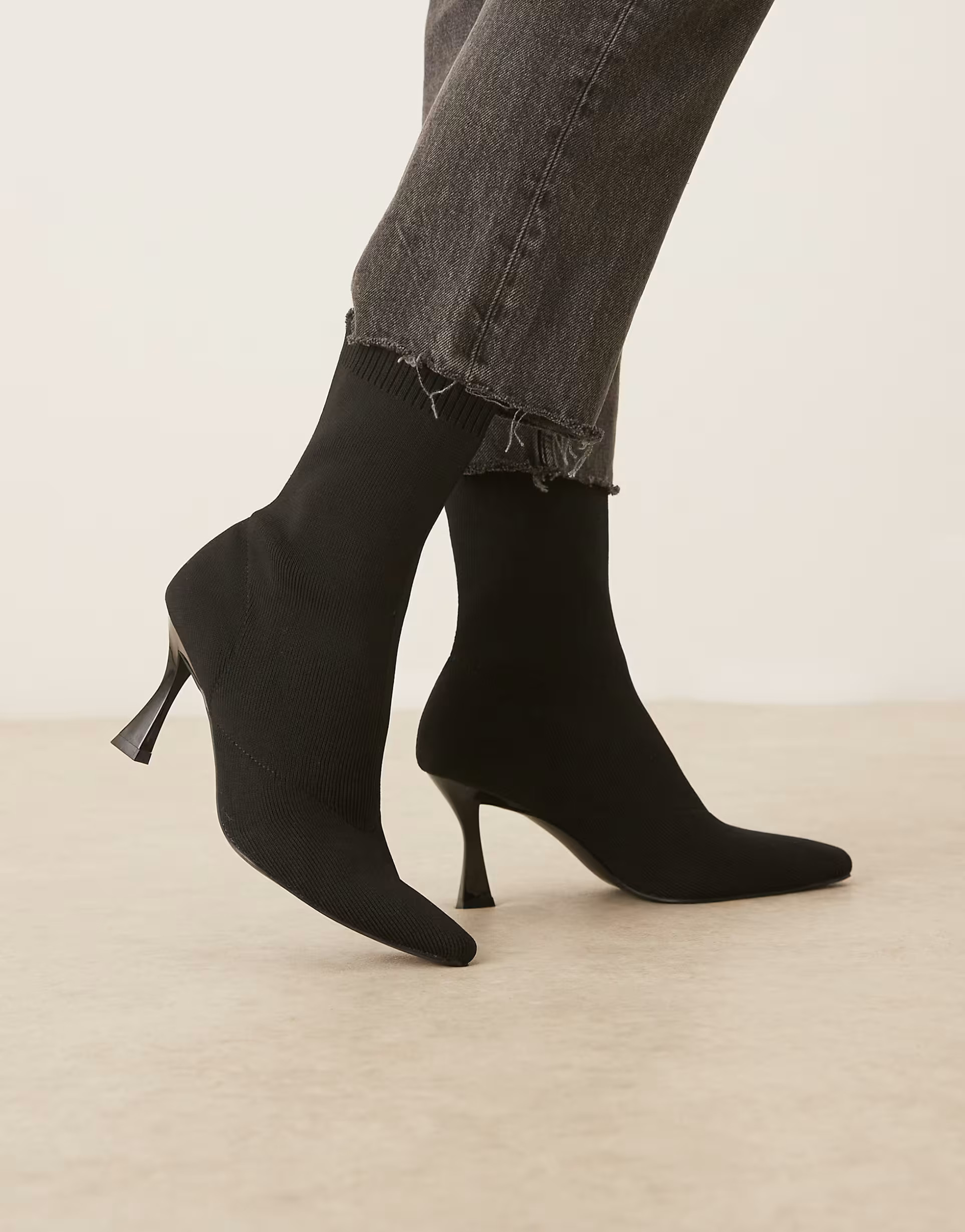 ASOS DESIGN Reagan chisel toe sock boots in black knit | ASOS (Global)