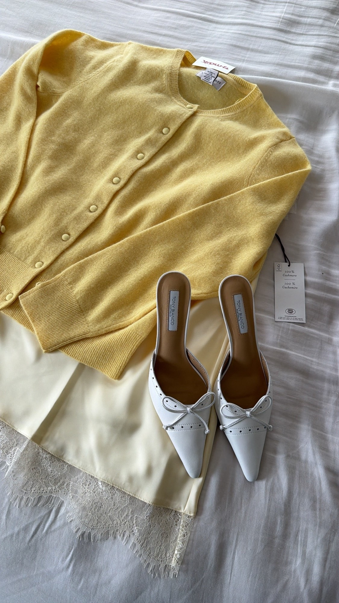 Get the look, yellow, button-down cardigan, silk butter, yellow lace skirt, pointy bow heels, shoes, date, night, spring, summer, Easter outfit idea.

#LTKSaleAlert
