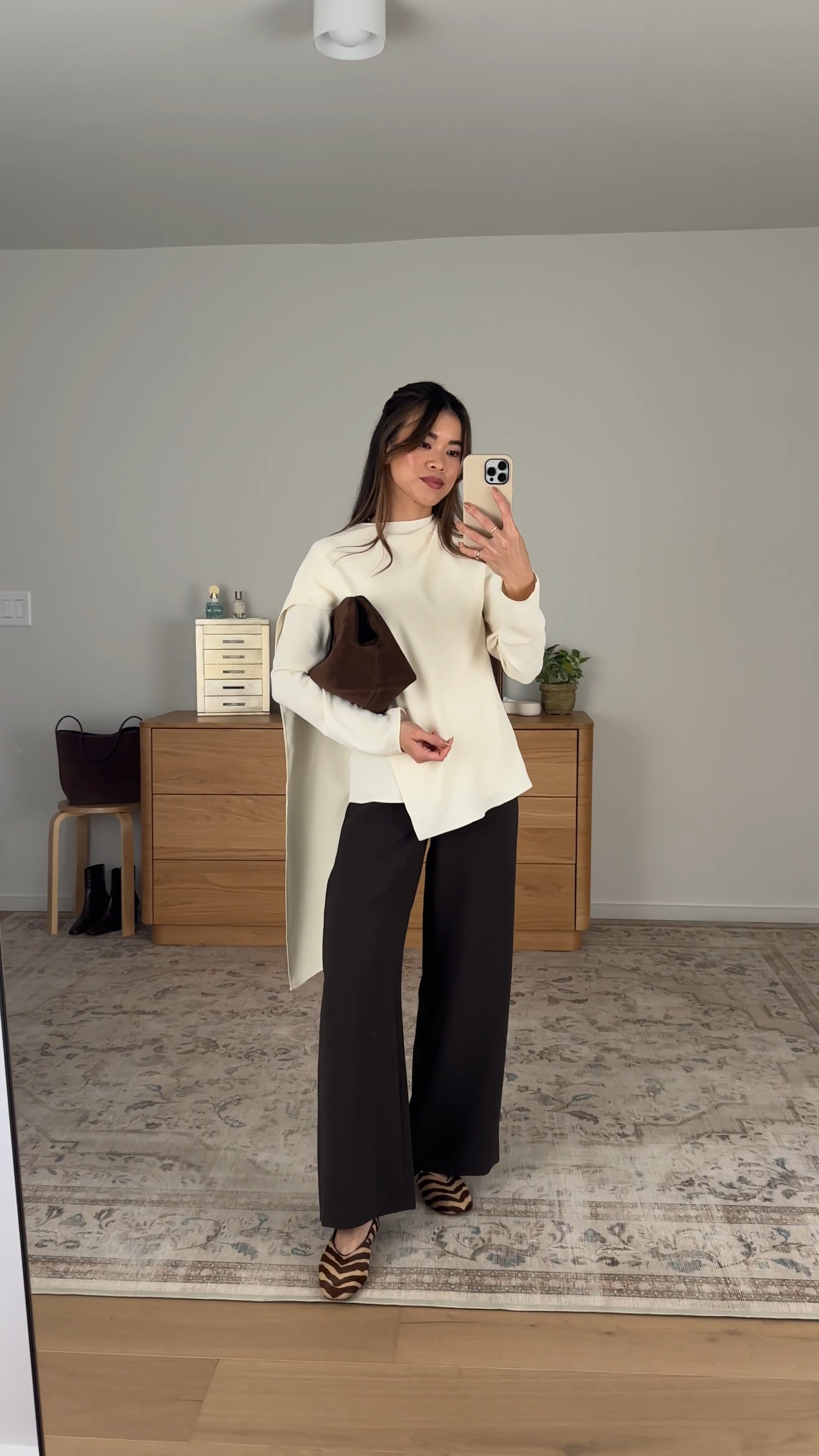 This @Aritzia top is so chic! Wearing it with my favorite pants.

Sizing info:
-Aritzia Loretto Blouse (Size 2XS in Seaside Cream)
-Aritzia the Lodge Pant - Crepette
(Size 2XS Short in Cacao Nib Brown)

Aritzia best sellers, best pieces from Aritzia for petite, Aritzia pants for petite, what pants from Aritzia will fit if youre petite, Petite style guide, how to dress if you’re petite, Petite style, petite fashion, mom outfit, mom style, petite pull on pants, petite outfit ideas, petite outfits, best pants for petite, petite dress pants, fall style, fall outfits, autumn outfit, vacation outfits, Aritzia try on, fall blouse, white top

#LTKootd #LTKSeasonal #LTKPetite