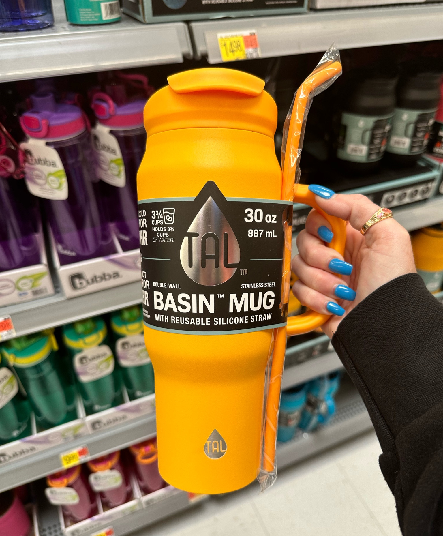 TAL Stainless Steel Basin Water Bottle with handle 30 fl oz, Black. Introducing the perfect hydration solution for life on-the-go - our 30 fluid ounce water bottle with a silicone straw that fits in a cup holder! Whether you're commuting to work, running errands around town, or just need a convenient way to stay hydrated throughout the day, this bottle has got you covered. Crafted from high-quality materials, this water bottle is built to last and can withstand even the toughest of daily routines. The large 30 fluid ounce capacity means that you can stay hydrated for longer, while the convenient silicone straw makes it easy to take a sip on-the-go without having to unscrew the lid. And with a design that fits in most cup holders, this water bottle is the perfect companion for your daily commute or road trip. Simply pop it in your car's cup holder and you're ready to go. For care and use, please hand wash in warm water with a soft sponge and dish soap.
This TAL Basin water bottle holds 30 fluid ounces

Double wall insulated keeping your favorite beverage cold or hot
Eco-Friendly

#LTKFind #LTKSeasonal #LTKGiftGuide