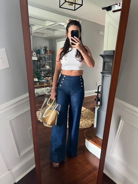 Loving this style of jeans but I would size up (wearing a 27) & find a style that doesn’t require me to wear 5” heels 

High waist denim. High waist flared denim. Flared jeans. Crop top and high waist flare jeans. Clear tote. Casual flare jeans.

#LTKSeasonal #LTKFind #LTKunder50
