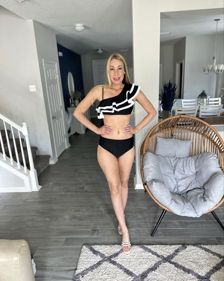 This swim suit style reminds me of a modern day 20’s style
🩵 wearing size small and it fits perfectly 
 🩵 padding in the top and the one strap is removable 

#LTKfindsunder50 #LTKstyletip #LTKswim